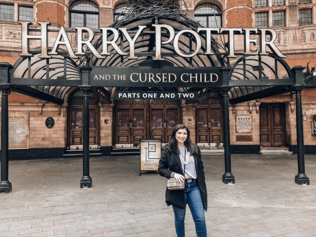 Angela Altieri stands outside the theatre for Harry Potter and the Cursed Child.