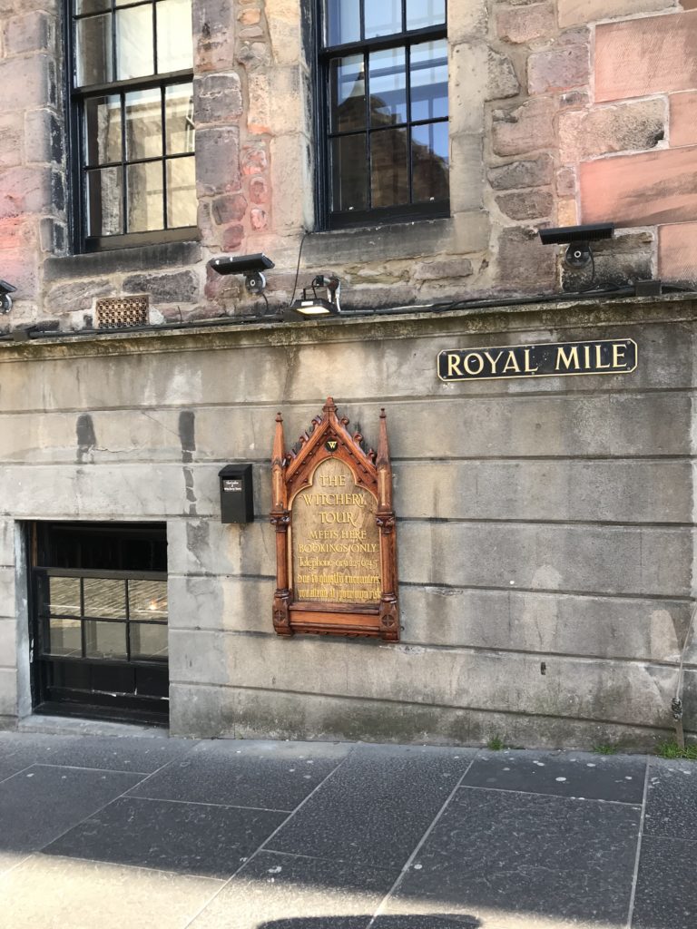 A sign marks that pedestrians are on the famous Royal Mile in Edinburgh.