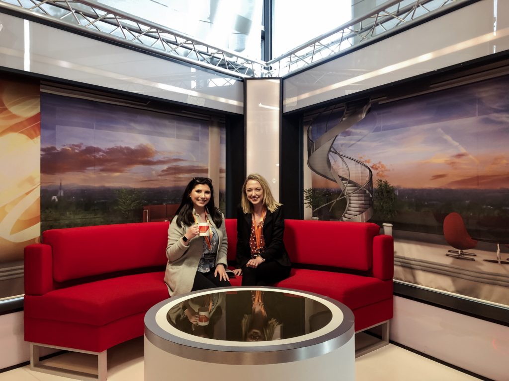 Kayla Snyder and Angela Altieri sit on set at BBC Media City UK.
